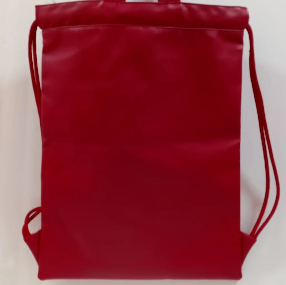 JORDAN Red Faux Leather Drawstring Backpack with Gold Jumpman